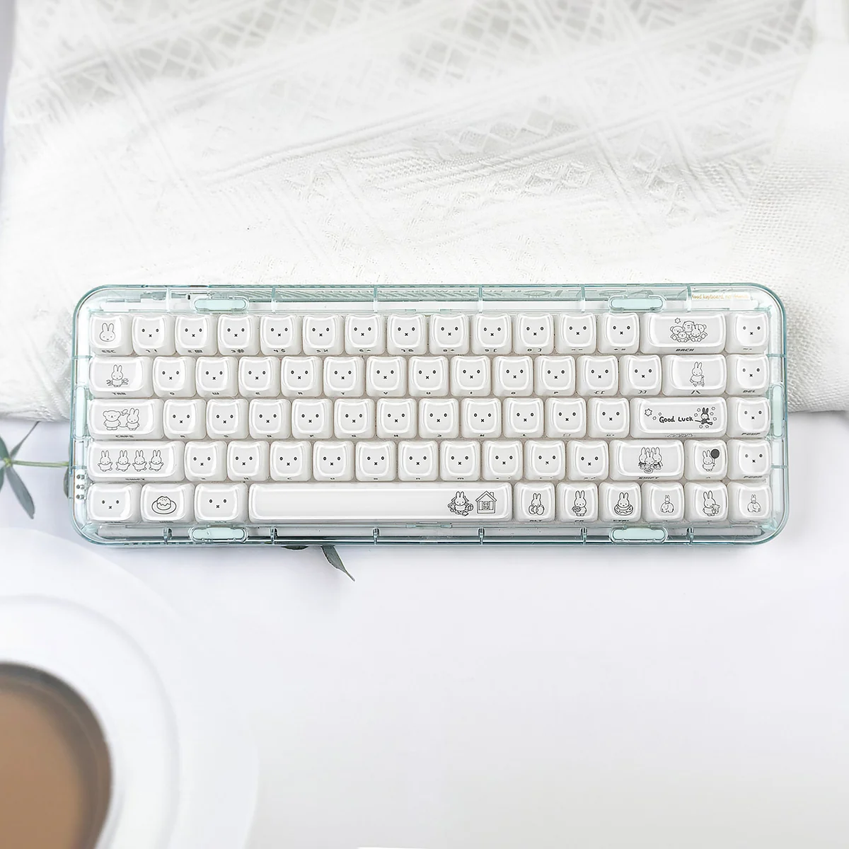 Detailed views of Miffy crystal jelly MAO keycaps set in pastel pink and white, emphasizing the translucent material and precise side-engraved Miffy icon design.