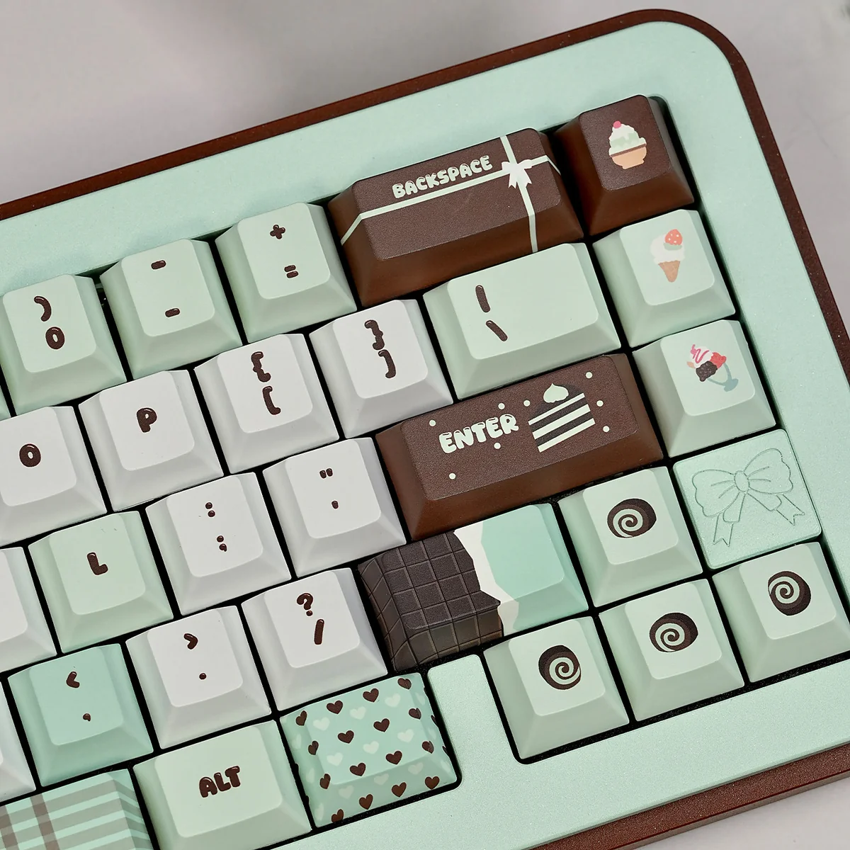 Sweet mint dessert keycaps set gallery, showing various angles of the refreshing pastel green and cream PBT dye-sub set with charming designs.