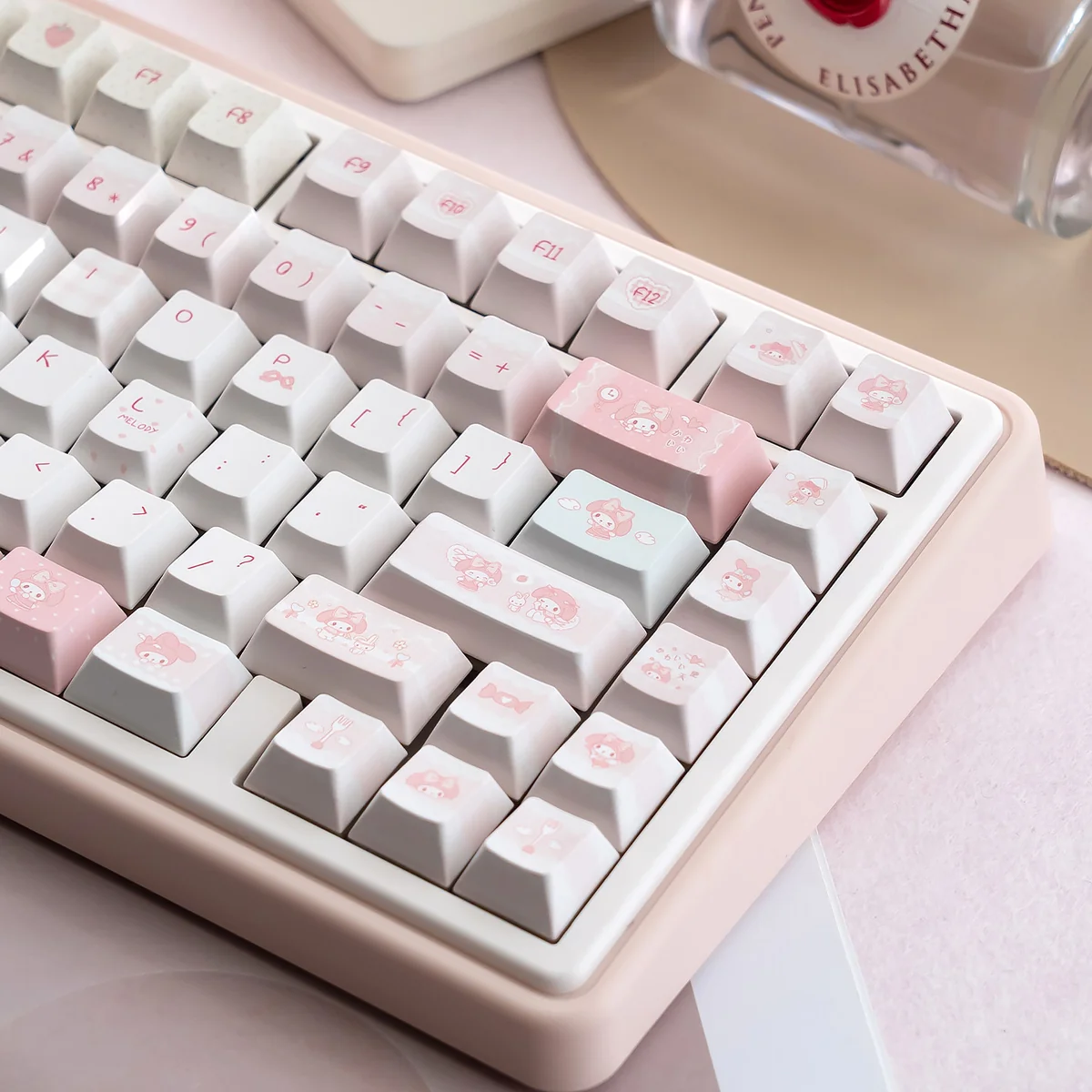 Cute My Melody keyboard in pastel pink, featuring silent mechanical switches and tri-mode fun, captured from various playful angles.