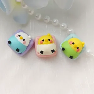 Vibrant, whimsical handcrafted parakeet resin keycap, showcasing an intricately layered miniature parakeet design, a unique and adorable keyboard accessories.