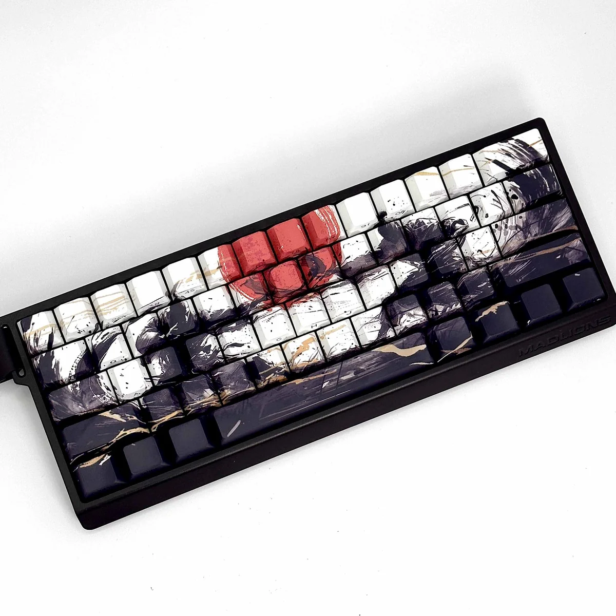 Artistic views of the Sunset War side-printed PBT keycap set. Features durable PBT, vibrant dye-sublimated graphics, and a unique battle-worn aesthetic.