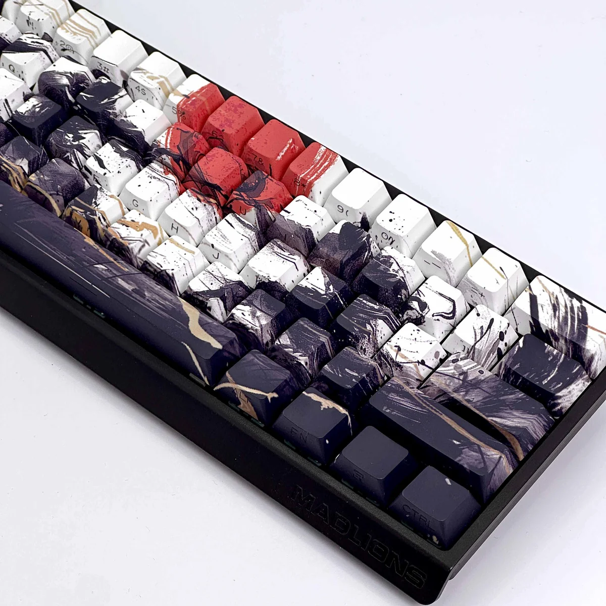 Side view of the durable PBT keycap set, highlighting crisp side-printed 'Sunset War' legends and vibrant, battle-worn sunset graphics.