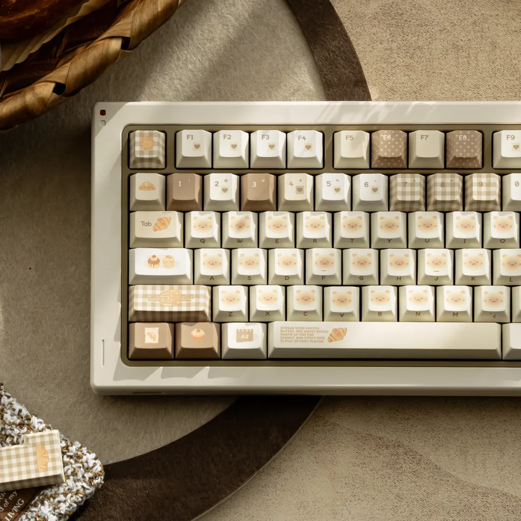 Artistic Bakehouse Cherry Keycap Set. Detailed view highlighting unique warm toasted hues, clean minimalist side legends, and premium design.