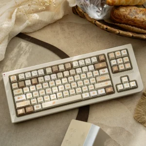 Unique Bakehouse Cherry Keycap Set. Features warm, toasted hues and clean, minimalist side legends. Premium PBT Keycaps for an artistic design.