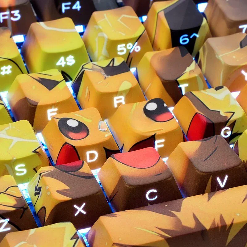Vibrant yellow Iconic Pikachu PBT backlit keycaps set from multiple angles, highlighting the iconic graphics and luminous side-engraved legends.