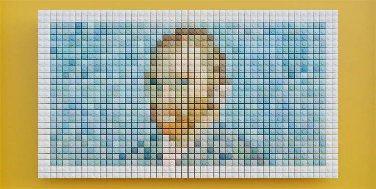 Multi-angle view of the large artistic mouse pad, showcasing its unique pixel art design and durable, waterproof construction on a contemporary desk setup.