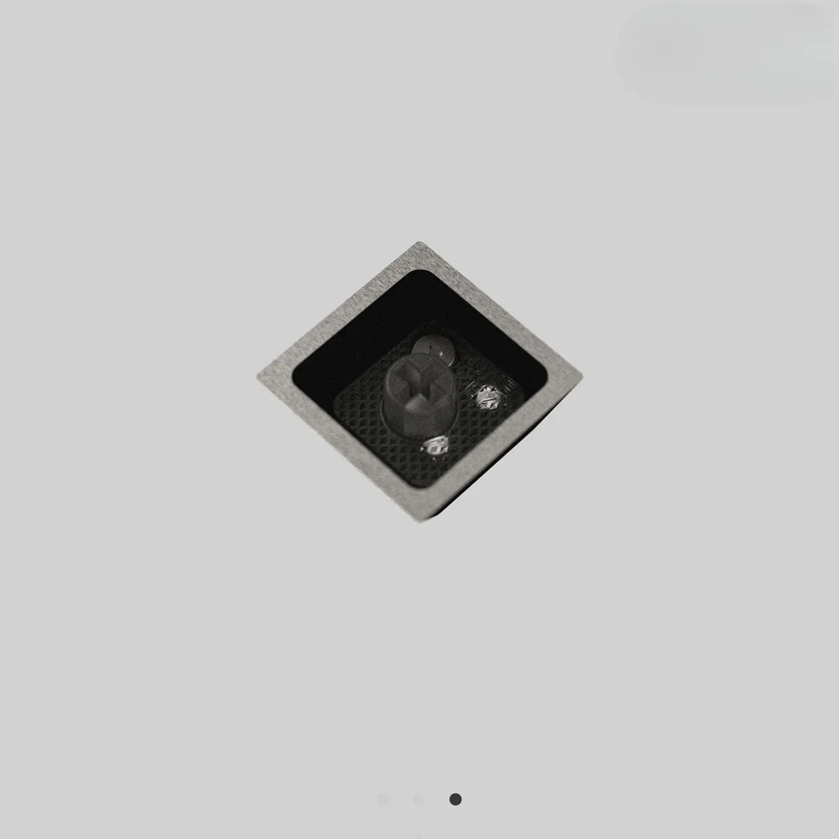 Gallery view of PE-K-4 BKRE-L anodized keyboard keys, featuring minimalist metal design in black and retro white.