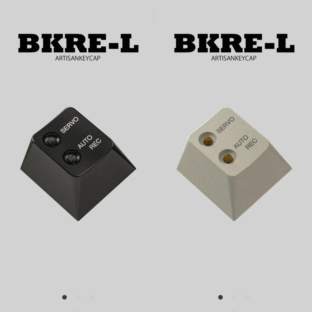 PE-K-4 BKRE-L custom aluminum keycap in sleek black, showcasing its minimalist design and anodized finish.