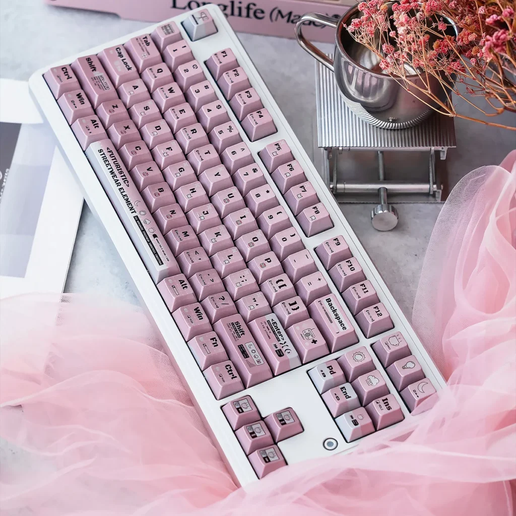 Charming Programmer Keycap Set featuring a whimsical character design and a sophisticated pearlescent shimmer, perfect for tech enthusiasts.