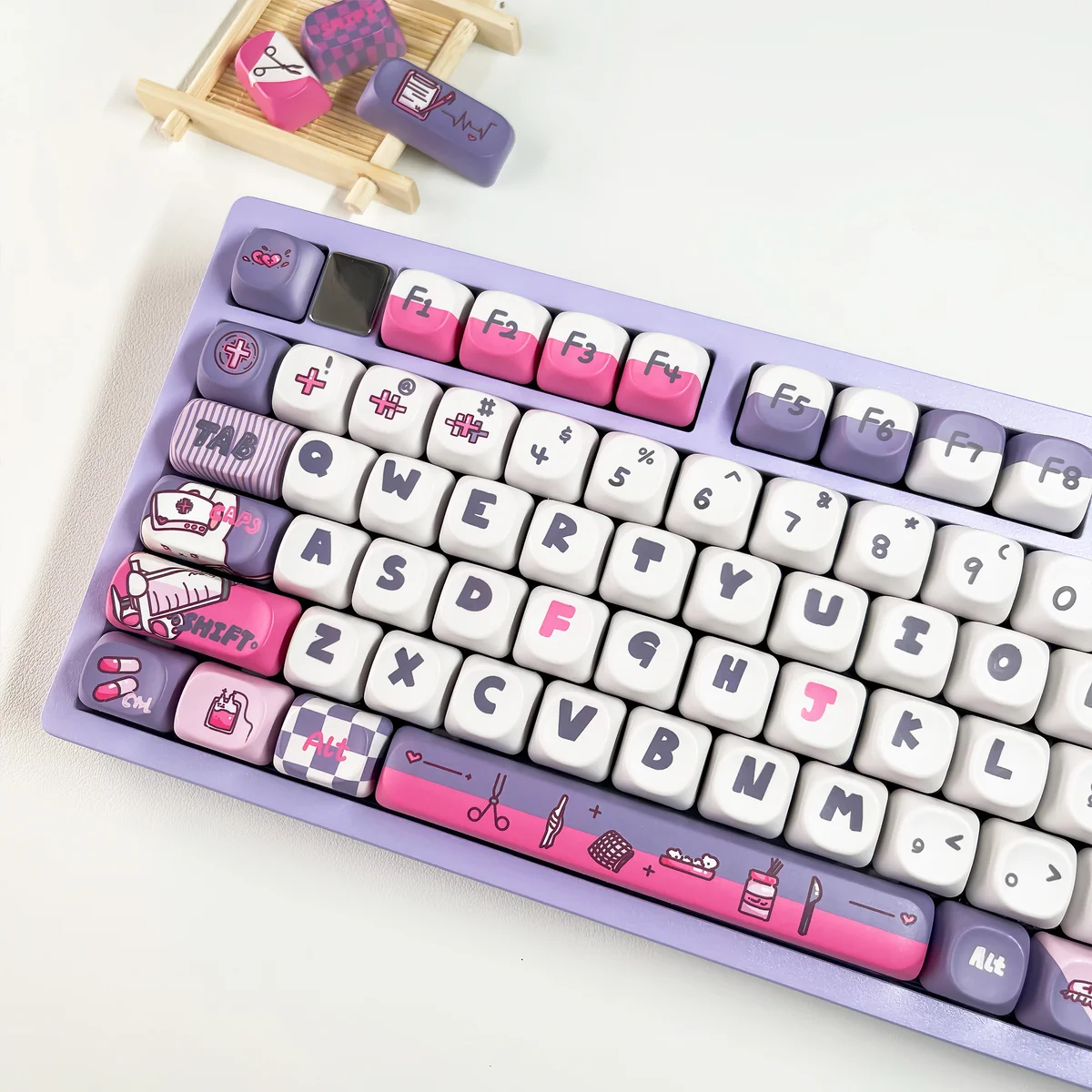 A gallery of the adorable Rabbit Nurse PBT Keycap Set, showing whimsical rabbit nurse designs from multiple angles with soft, playful aesthetics.