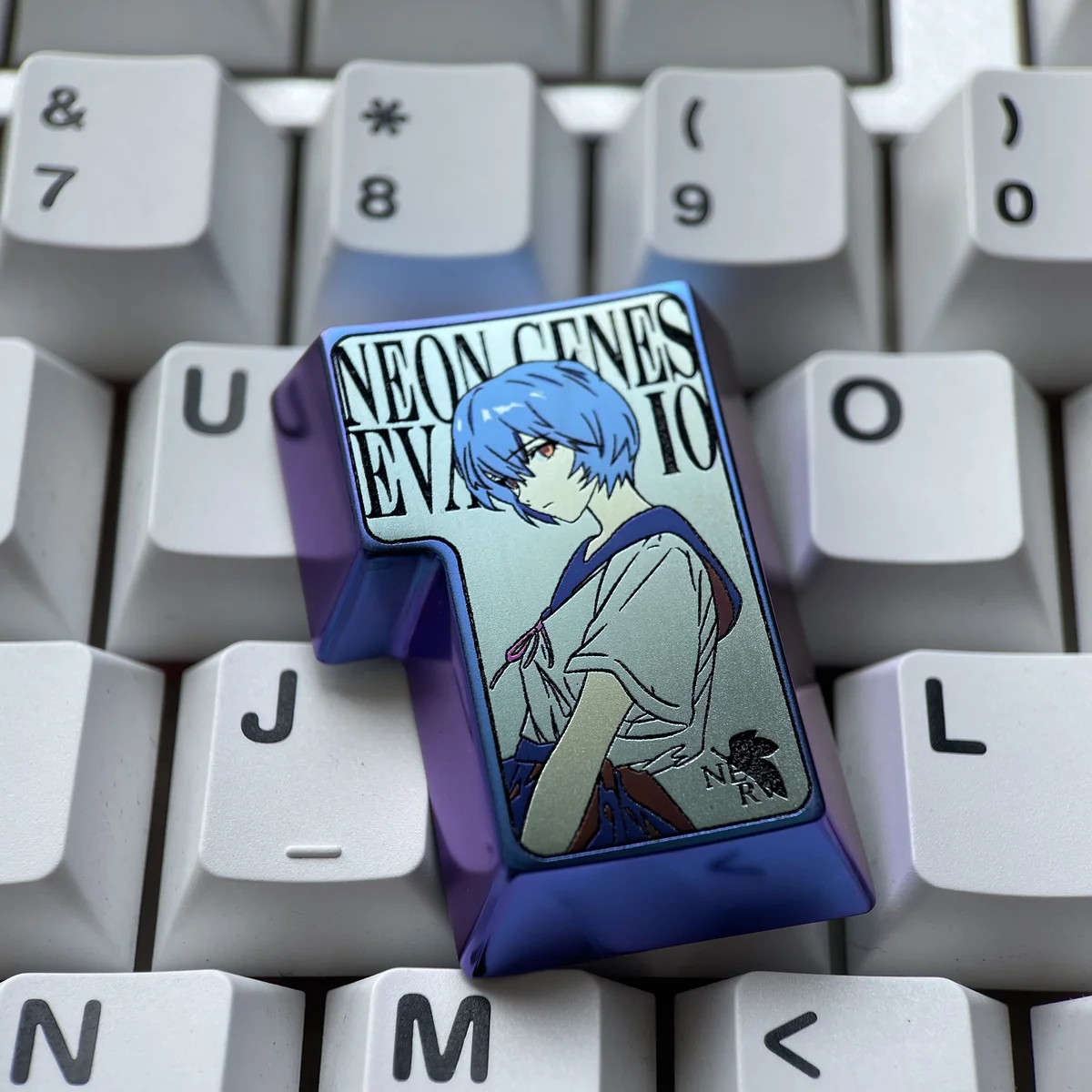 Collectible Rei Ayanami keycap, adding a unique anime touch to a mechanical keyboard setup.