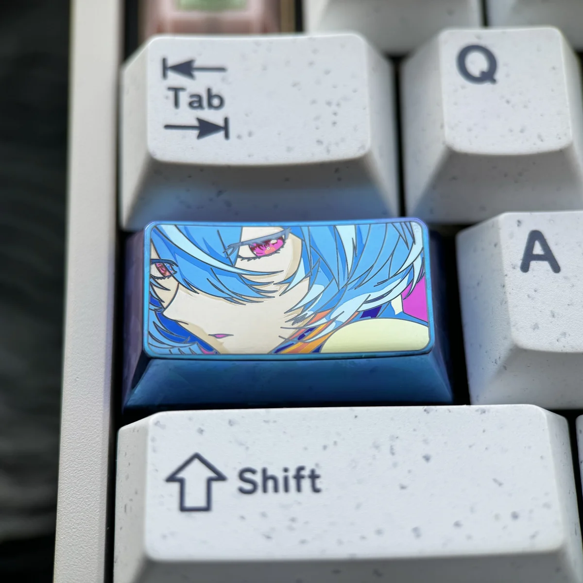Collection of images featuring the Rei Ayanami titanium keyboard accessory, perfect for NGE fans seeking a unique desk upgrade.
