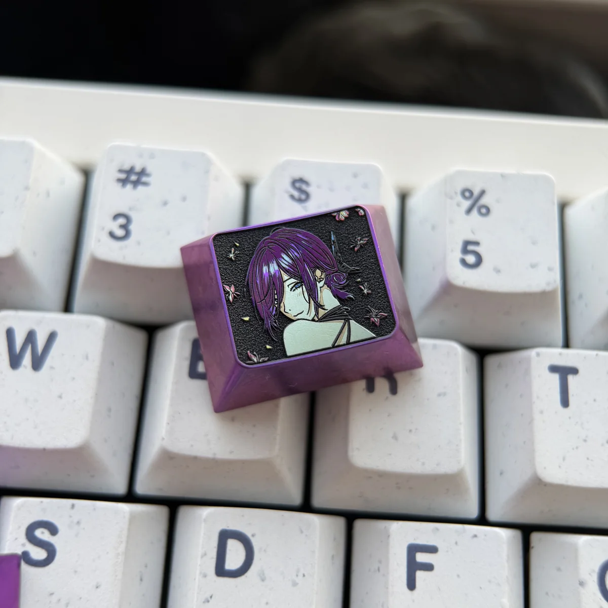 Handcrafted Chainsaw Man Reze Titanium Keycap, multiple angles, showcasing its dynamic design, sleek anodized finish, and bold anime aesthetic.
