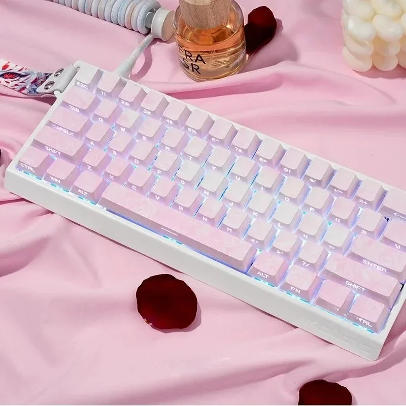 Close-up of a Rose Coast Luminous PBT keycap set, showcasing side-engraved legends glowing with soft pink, orange, and grey gradients, evoking serene design.