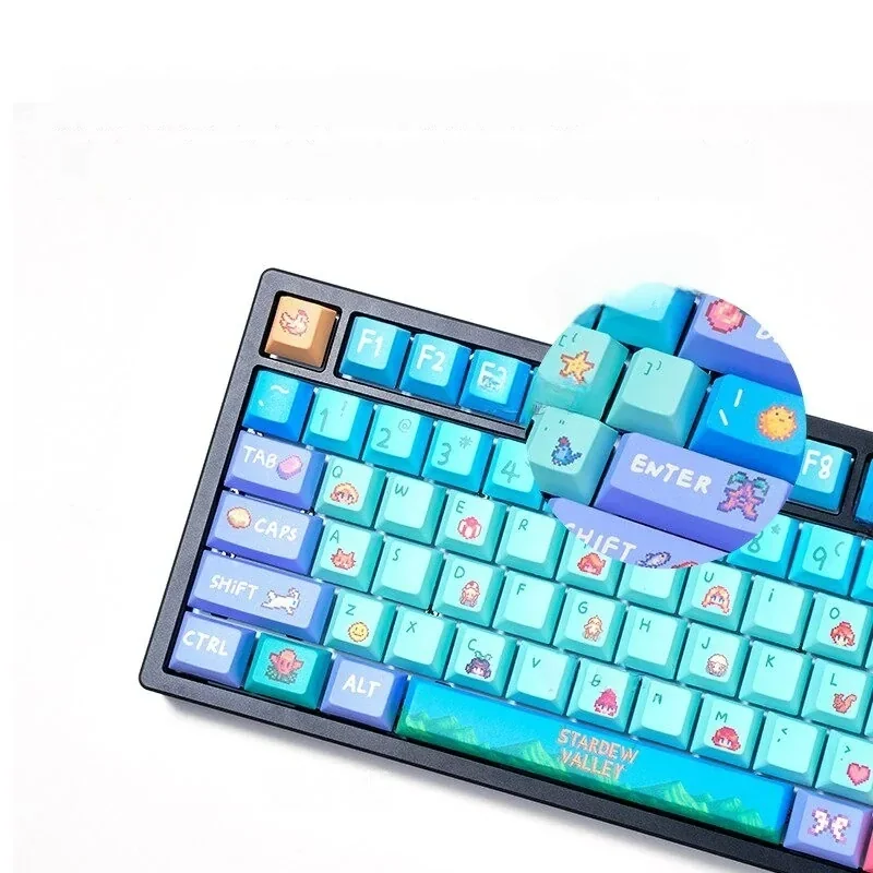 Detailed angled shot of the Stardew Valley PBT Dye-Sub Keycap Set, revealing vibrant pixel art farm elements and earthy tones for an immersive desktop.