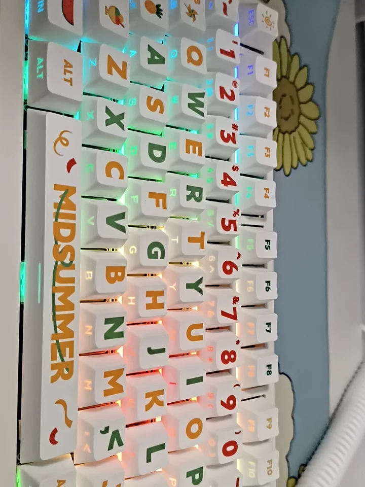 Vibrant Summer Party side-print PBT keycaps set in a gallery, showcasing playful designs and refreshing colors from multiple angles. Enjoy the unique side lettering design.