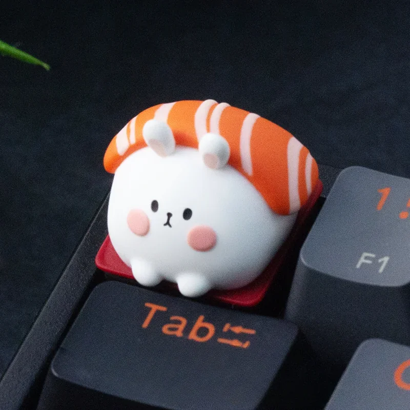 Close-up views of the handcrafted Sushi Rabbit ESC keycap, showcasing its whimsical resin art with an adorable character, vibrant colors, and layered design.