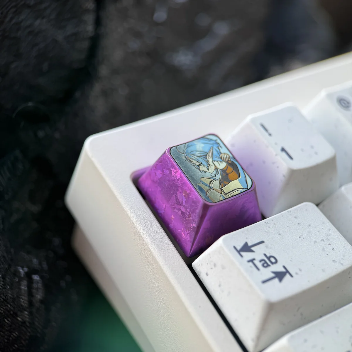 Premium Titanium Sylphiette artisan keycap for ESC, showcasing vibrant anime art from multiple angles on its polished surface.
