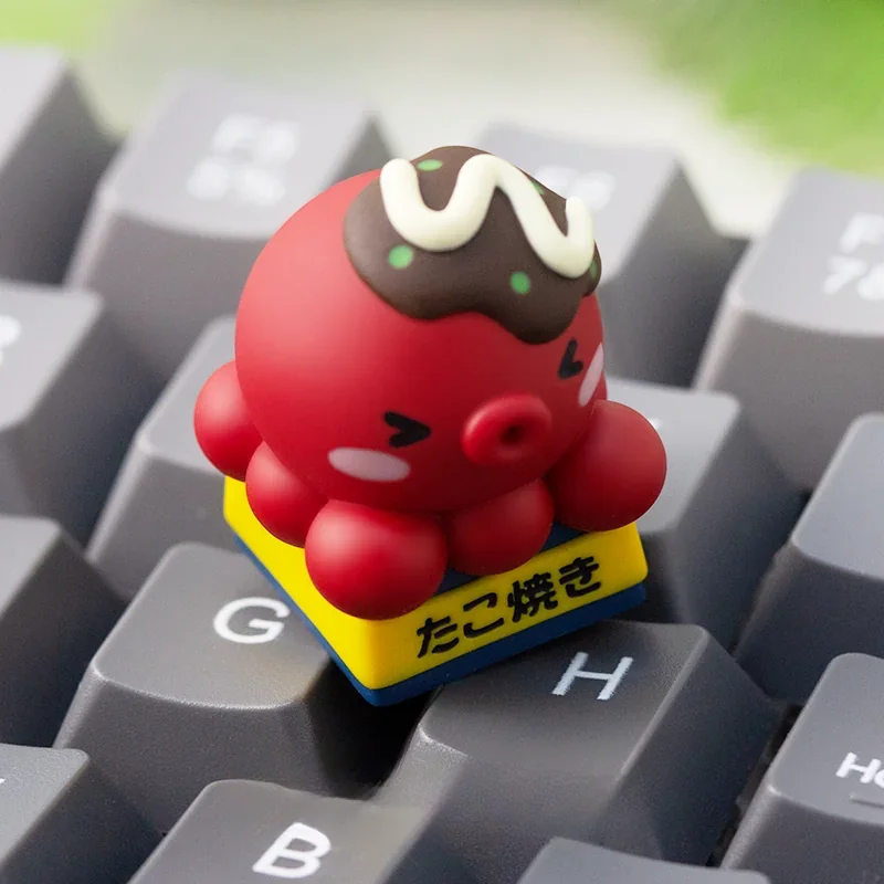 Explore different angles of this playful, handcrafted takoyaki resin ESC keycap, a vibrant miniature of realistic Japanese street food.