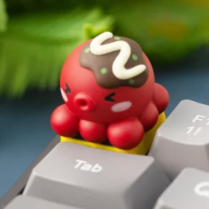 Vibrant handcrafted takoyaki resin ESC keycap, a realistic miniature Japanese street food design. This playful and artistic takoyaki keycap adds unique design.
