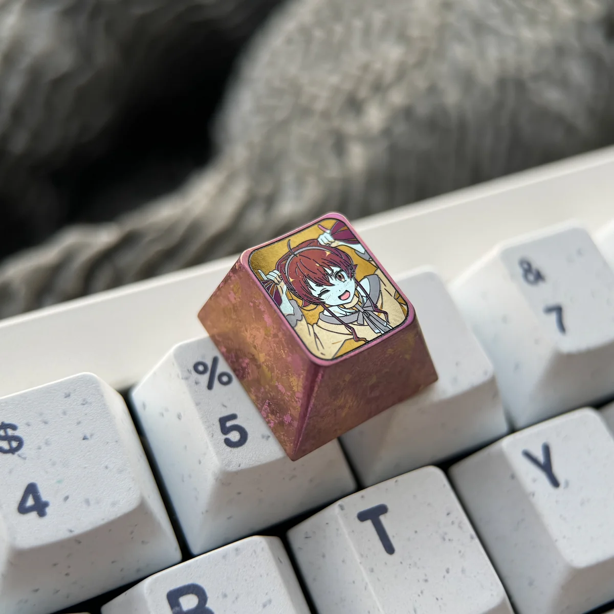 Exclusive Eris Boreas Greyrat titanium ESC keycap, shown from multiple angles. Vibrant anime art on polished metal, emphasizing its premium, durable alloy.