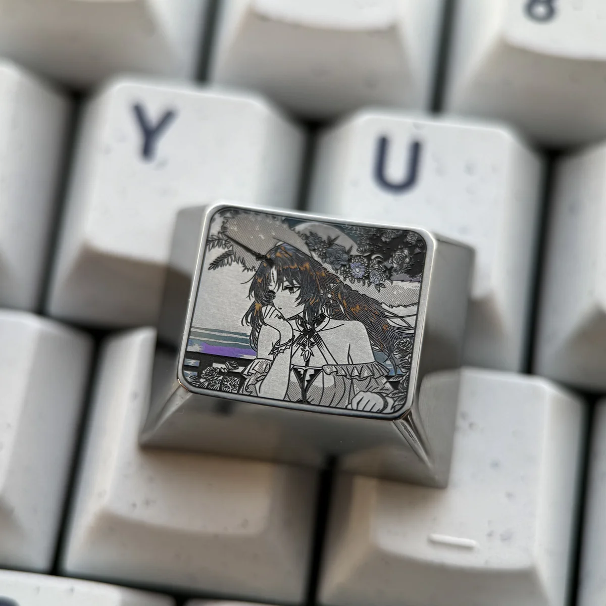 Cartethyia Precision Engraved Titanium Keycap. Detailed views of intricate metallic patterns on aerospace-grade titanium, highlighting industrial elegant design.