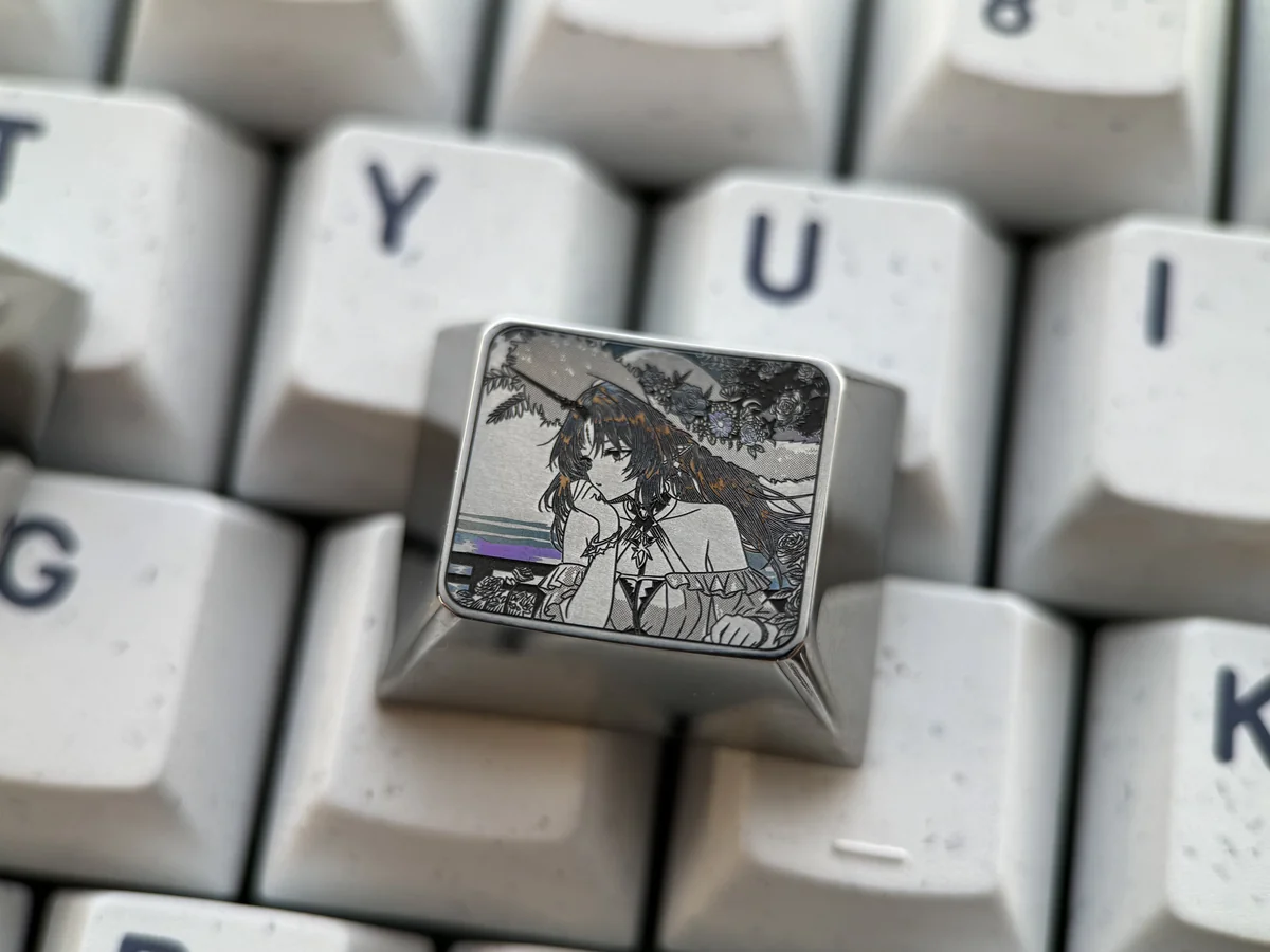 Close-up views of the Cartethyia precision engraved titanium keycap, showcasing its intricate metallic patterns and aerospace-grade craftsmanship from various angles.