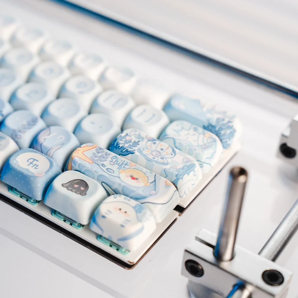 Immersive PBT Dye-Sub Underwater Keycaps Set, vibrant blue marine life and coral from a unique angle, reflecting deep ocean serenity.
