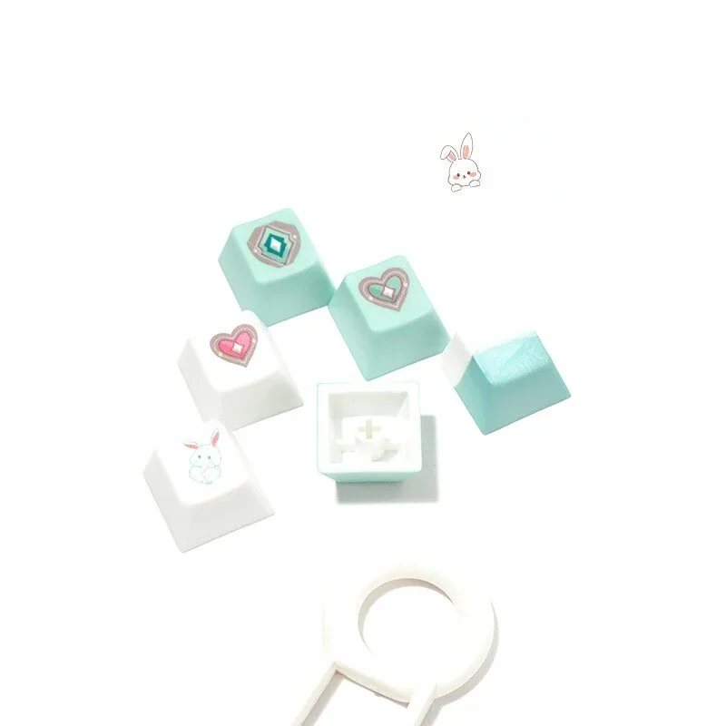 A close-up view of the Valorant Sage PBT dye-sublimated keycap set, showcasing the serene green and white character art and tactical motifs.