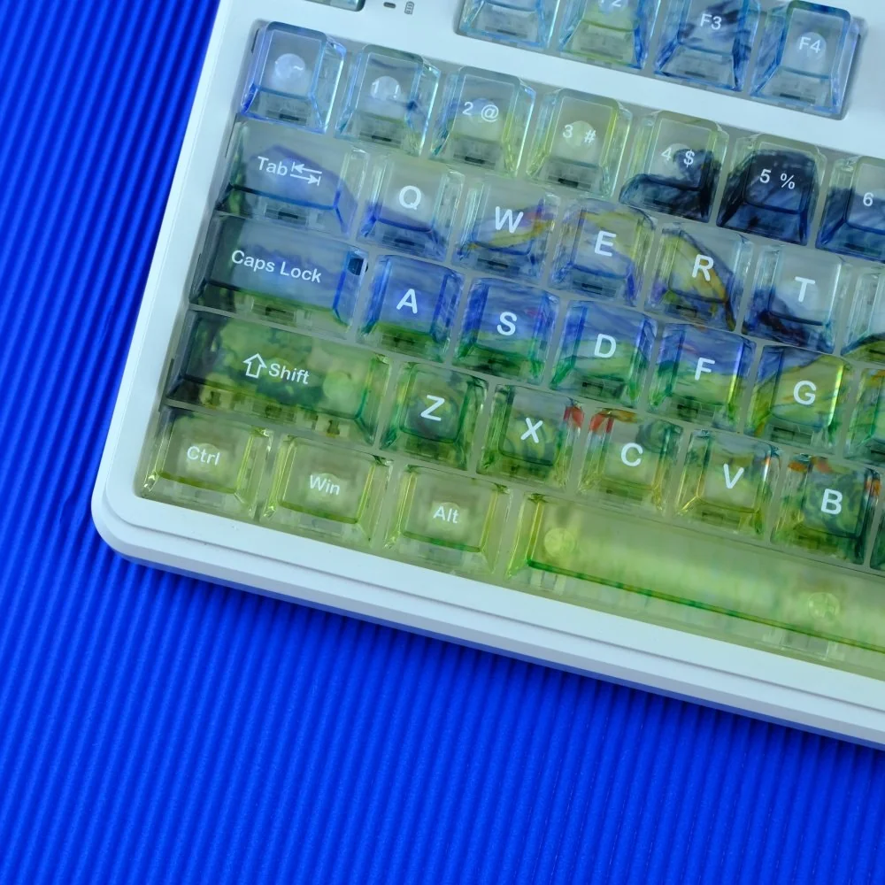 Van Gogh Misty Translucent PC keycaps set, viewed from various angles, revealing frosted translucent artistry and dreamlike backlighting.