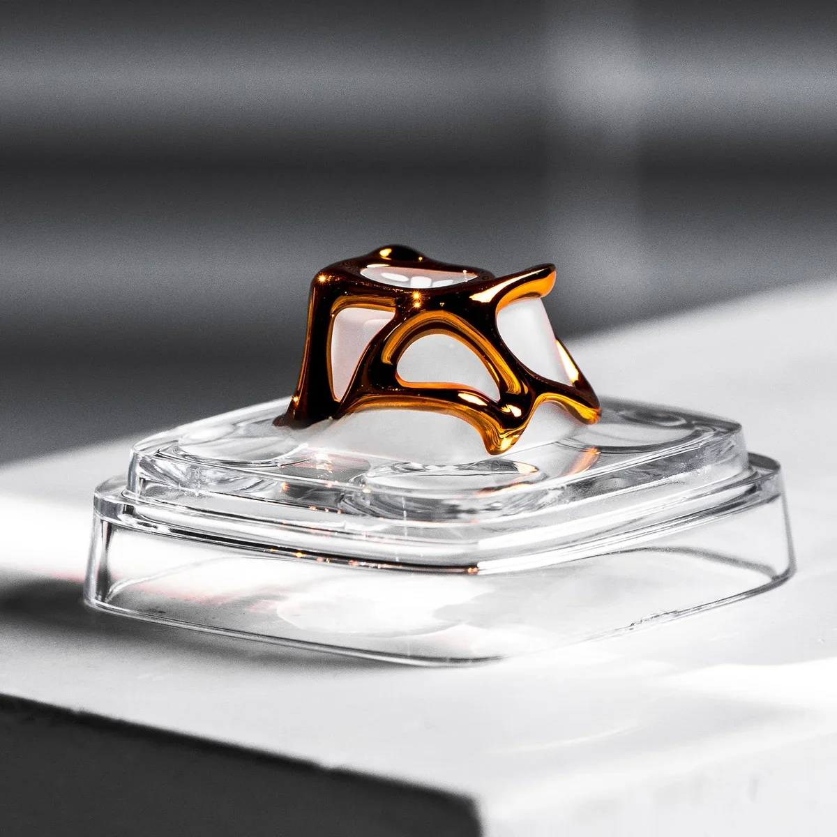 Handcrafted Venom keycap displayed from various angles, revealing its powerful alloy design encased in transparent resin, embodying a dark, artistic angles.