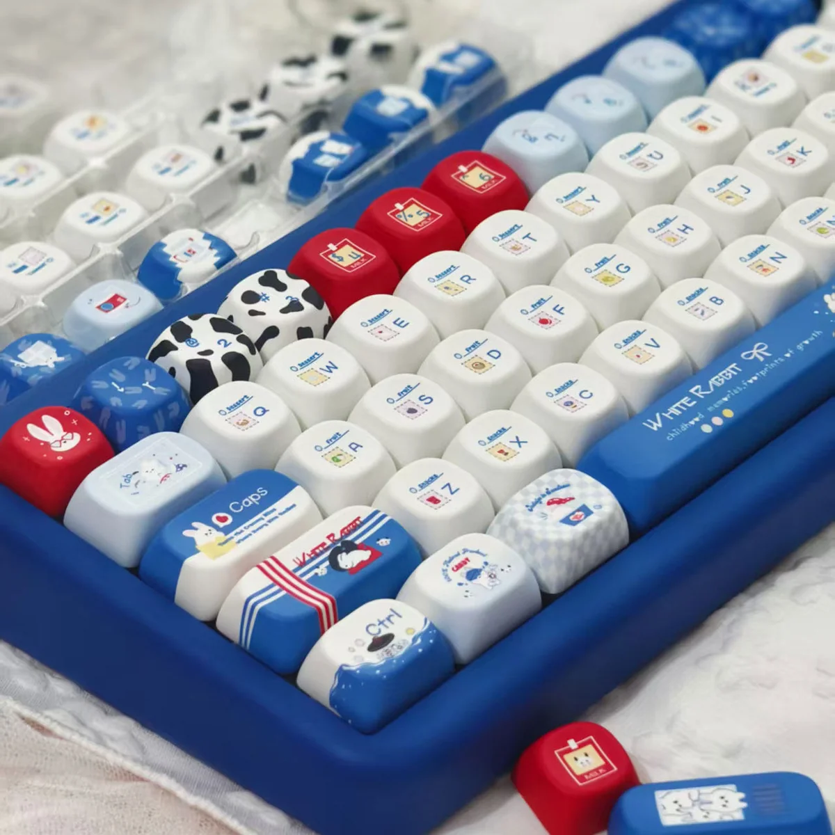 Detailed view of Milk Rabbit Candy pastel keycaps, emphasizing the high-quality PBT dye-sublimation and charming motifs.