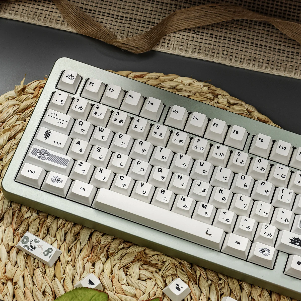 Multiple artistic views of the Subtle Multi-Tone White Zen PBT Keycaps Set, highlighting its clean lines, harmonious design, and natural aesthetic.