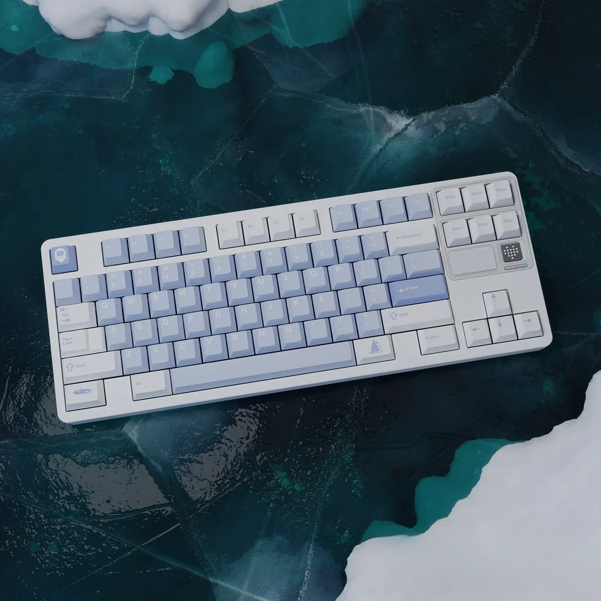 Durable PBT Winter Frost keyboard caps in frosty blue, crisp white, and cool blue, highlighting the serene winter aesthetic.