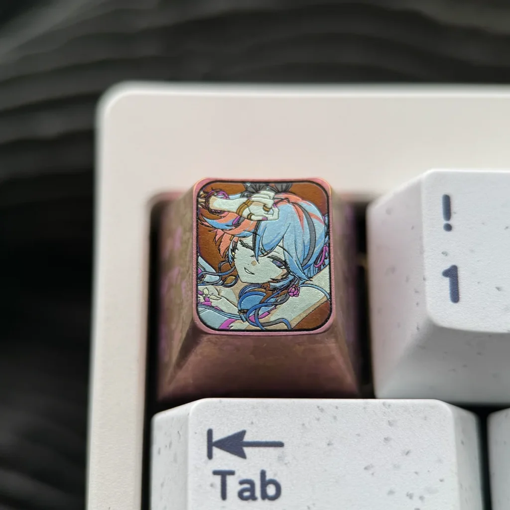 Wuthering Waves titanium ESC keycap showcasing intricate Camellya design and metallic sheen.