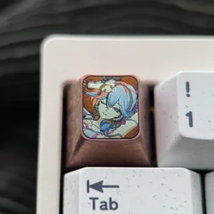 Wuthering Waves titanium ESC keycap showcasing intricate Camellya design and metallic sheen.