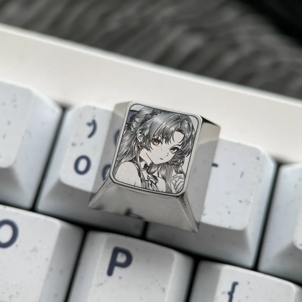 Vibrant, precision-engraved Wuthering Waves Carlotta titanium keycap showcasing intricate character art on a reflective surface.