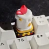 Backlit Candle Resin Keycap illuminating a keyboard setup in a dark environment