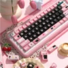 Close-up of Black Cat keycap legends, highlighting dye-sublimated details and playful cat designs