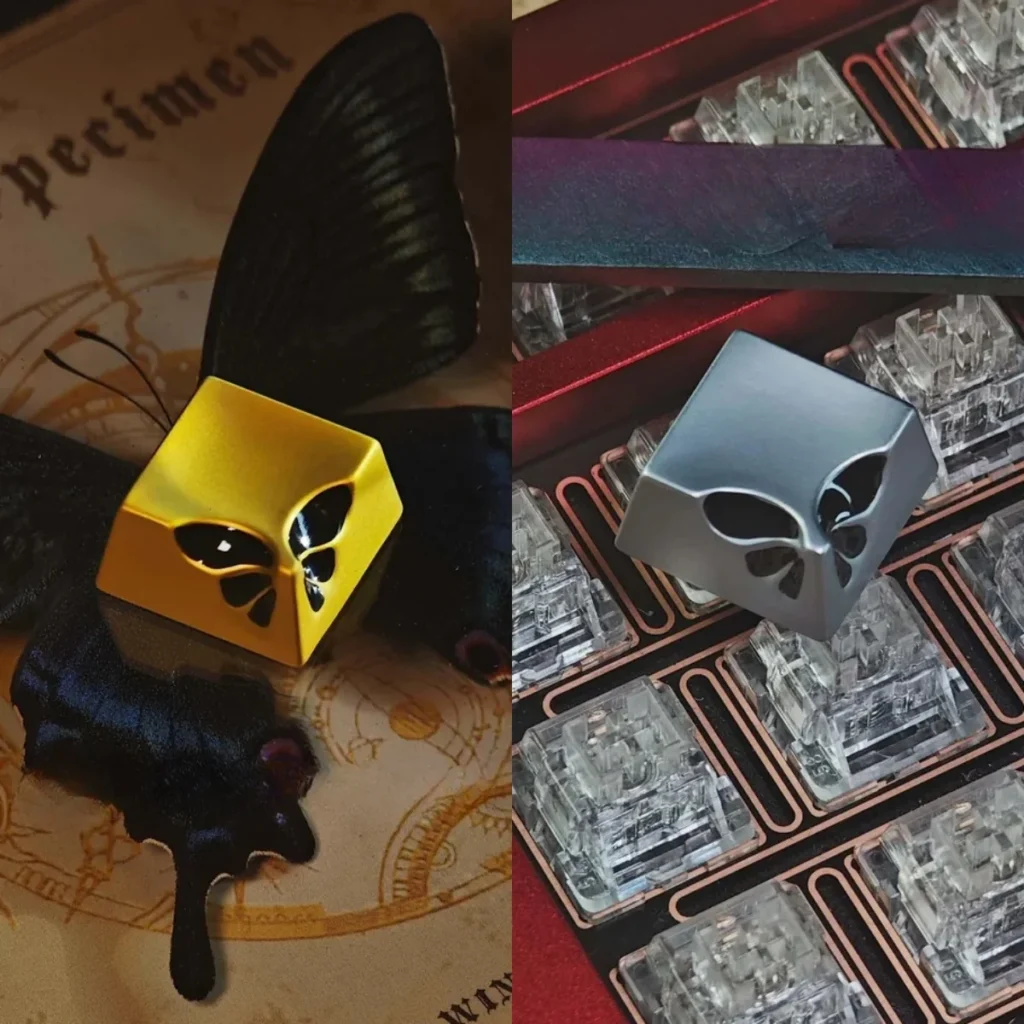 Elegant Black Gold Butterfly Metal Keycap on a dark mechanical keyboard