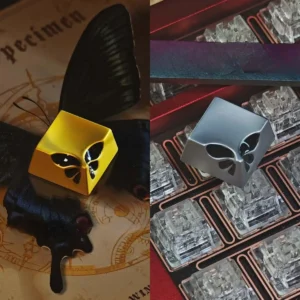 Elegant Black Gold Butterfly Metal Keycap on a dark mechanical keyboard