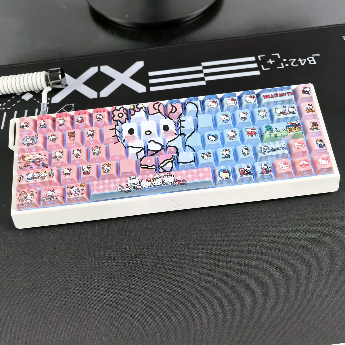 Detail view of Cherry profile Hello Kitty keycaps, highlighting texture