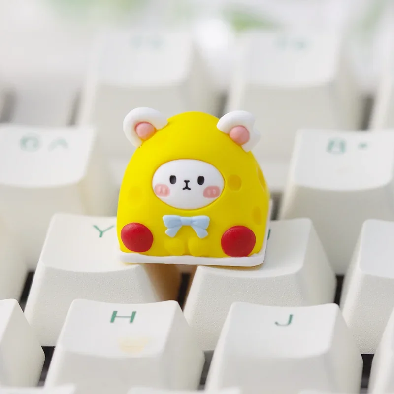 Close-up of handcrafted layered resin Dessert Mice keycap