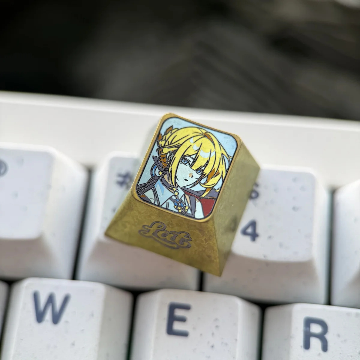 Angled shot of Evelyn Chevalier Zenless Zone Zero Keycap highlighting metallic finish