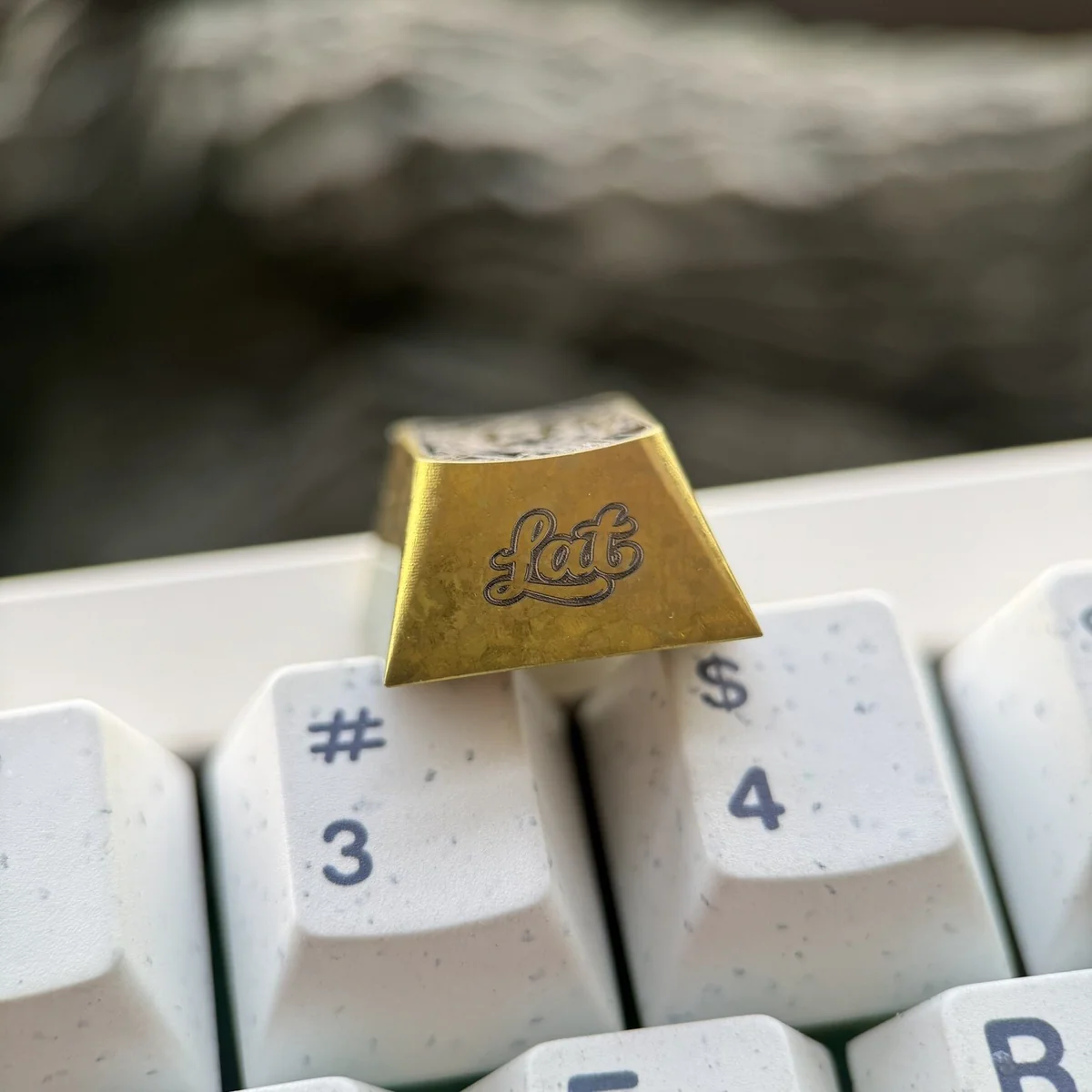 Detailed view of CNC-Machined Evelyn Chevalier Titanium Keycap texture