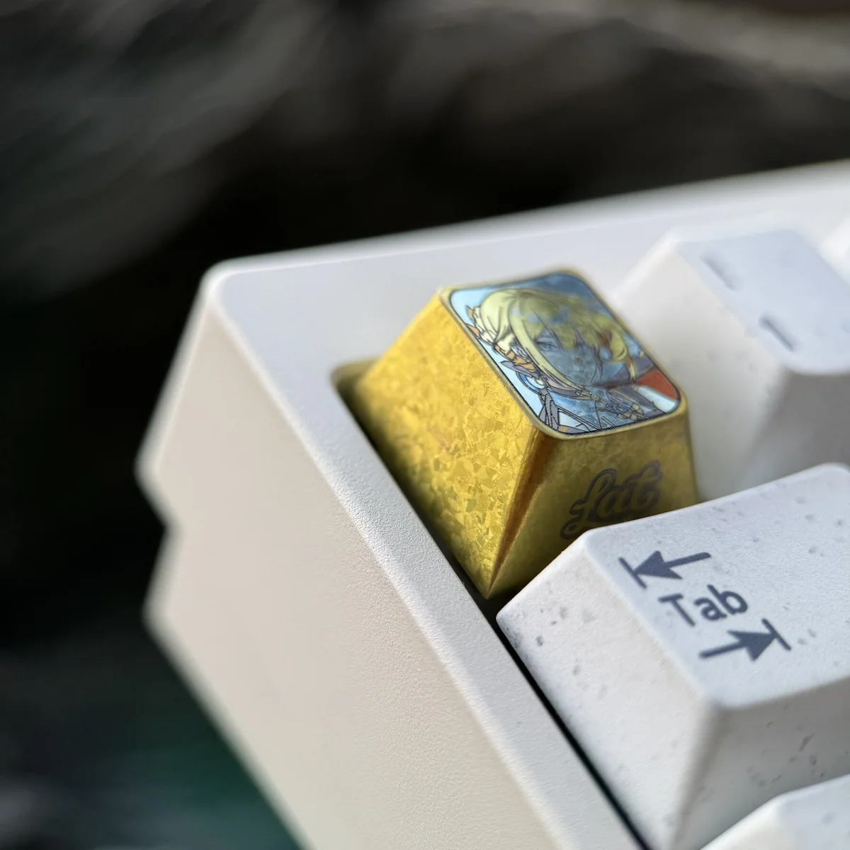 Futuristic Evelyn Chevalier Artisan Keycap in Titanium on a Gaming Setup
