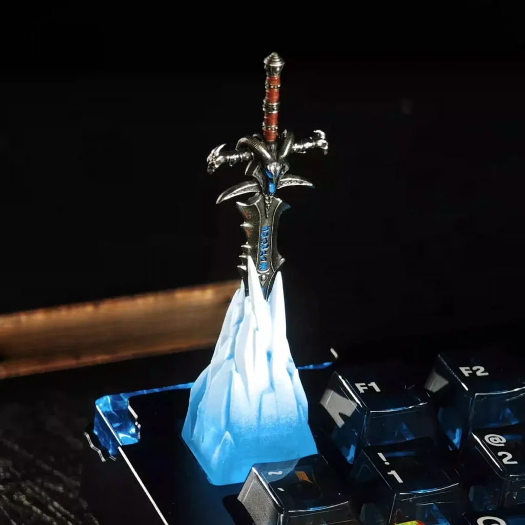 Handcrafted Frostmourne artisan keycap with removable sword on a mechanical keyboard