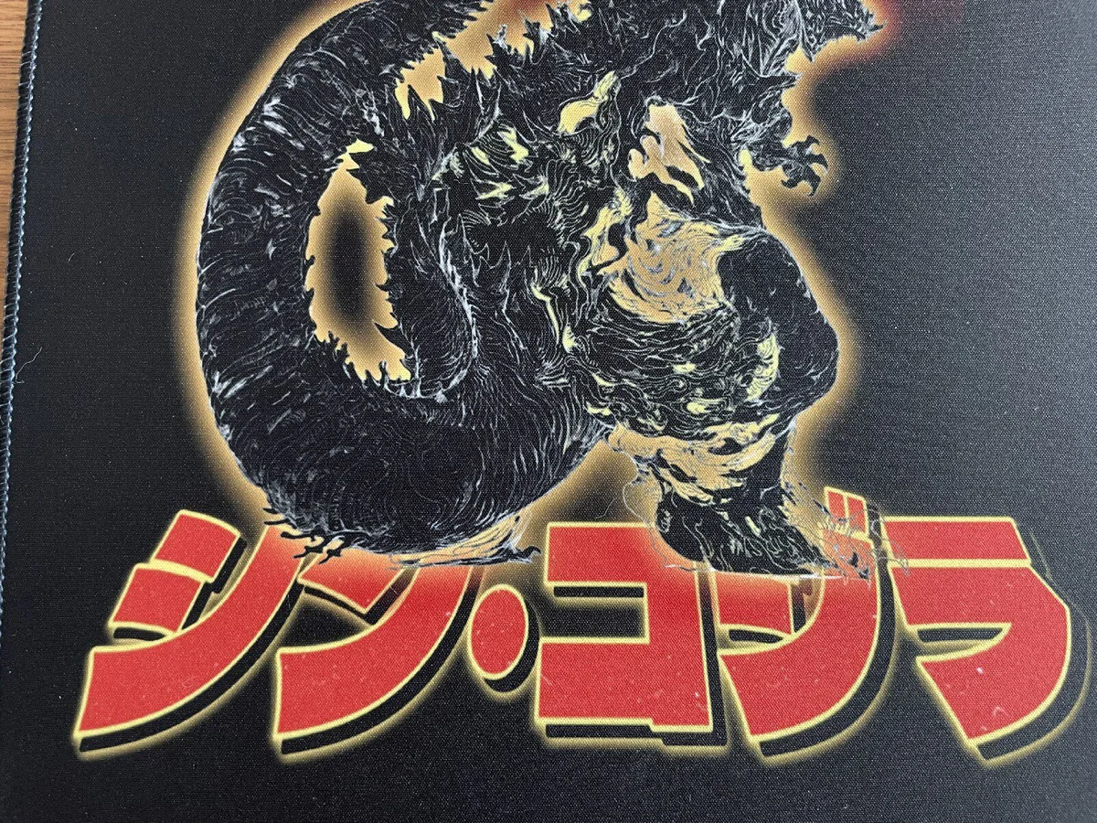 Godzilla mouse pad illustrating full desk coverage with keyboard and mouse