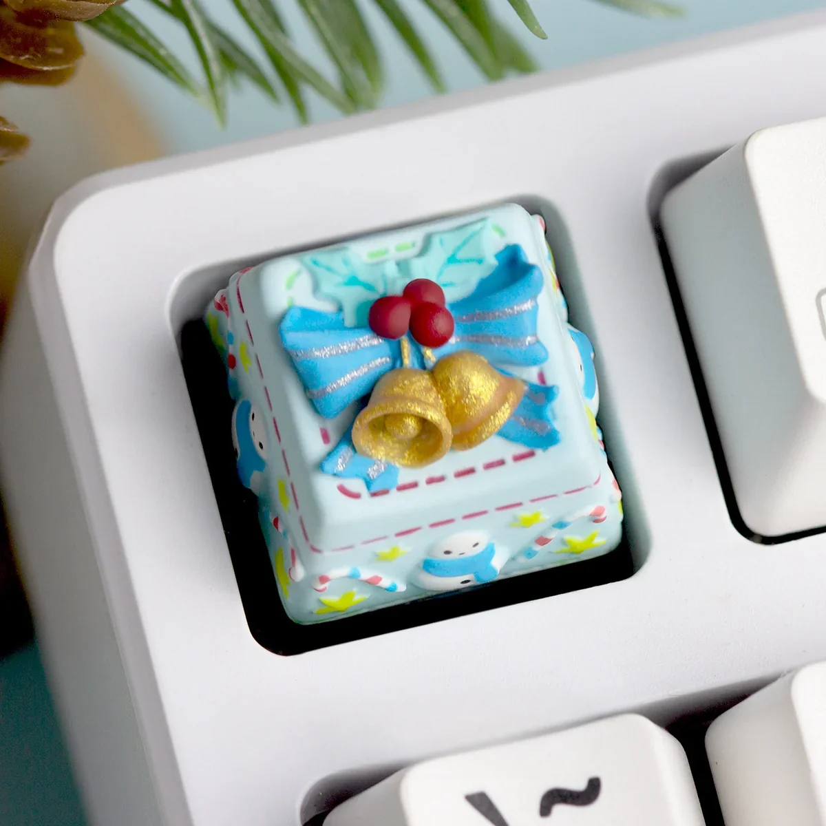 Christmas themed keycap showing intricate resin craftsmanship