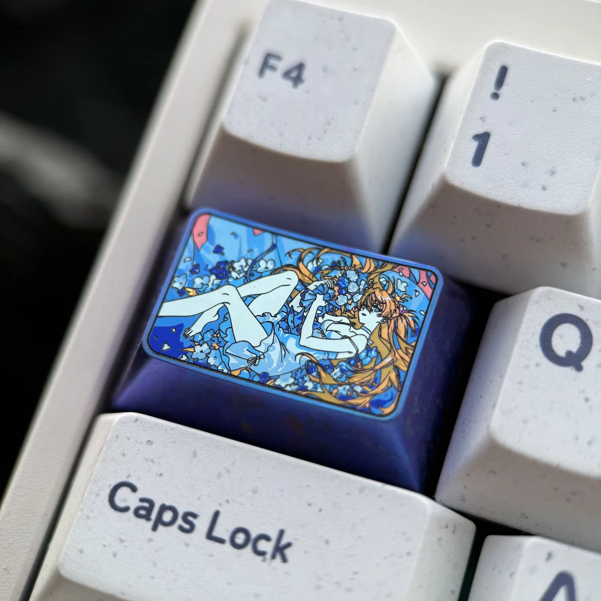 Handcrafted titanium keycap with Asuka character details